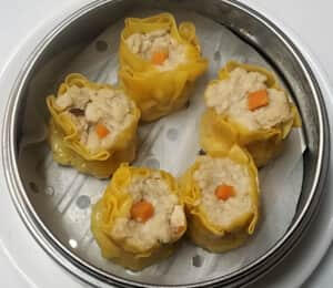 H05. Shumai $10.00 Steamed shumai with a vegan chicken and shrimp, shiitake mushroom, and carrot filling