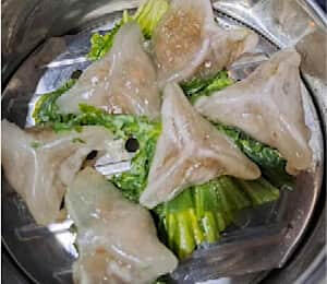H01. Crystal Steam Dumpling $9.00 Steamed crystal dumplings with a minced vegetable filling