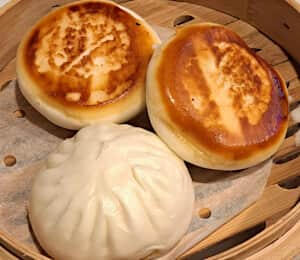 H11. Pan Fried Vegetable Bun $12.00 Pan-fried buns filled with napa cabbage, carrots, mushrooms, celery, green peas, and jicama