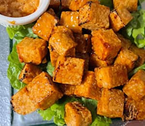 08. Teriyaki Tempeh $8.00 Grilled Indonesian soy cakes in teriyaki sauce