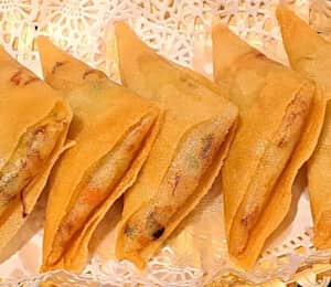 12. Curry Samosas $10.00 Homemade veggie pastries with a tangy vinegar sauce (homemade duck sauce) on the side