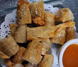 14. Vegan Lobster Roll $9.00 Deep-fried soy protein and carrots with a tangy vinegar sauce (homemade duck sauce) on the side