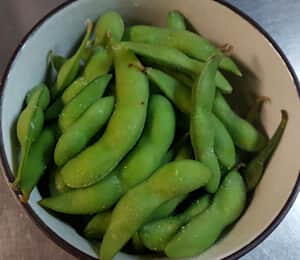 09. Edamame $8.00 Boiled green soybeans in pods