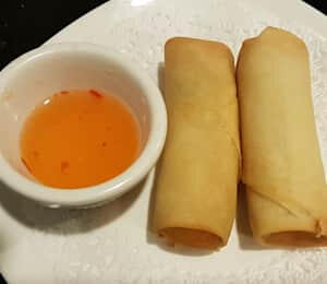 01. Spring Rolls $6.00 2 deep-fried spring rolls filled with bean thread vermicelli, cabbage, carrots, onions, and mushrooms with a tangy vinegar sauce (duck sauce) on the side