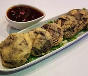 18. General Tso Shiitake Mushroom $15.00 Deep-fried, breaded shiitake mushrooms with a spicy brown dipping sauce