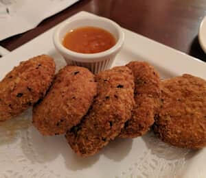 11. Crispy Vegan Chicken Nuggets $10.00 Deep-fried, breaded soy-based nuggets with a plum sauce on the side