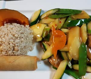 L13. Mango Vegan Chicken Lunch $15.00 Sautéed thinly sliced soy protein in a mellow plum sauce with mango, zucchini, asparagus, bell peppers, and onion