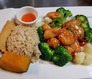 L11. Sweet & Sour Vegan Chicken Lunch $15.00 Deep-fried soy protein in sweet and sour sauce with broccoli, pineapple, and bell peppers, topped with sesame seeds