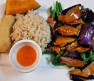 L05. Eggplant String Bean Lunch (Spicy) $14.00 Sautéed eggplant in basil and garlic sauce on a bed of string beans