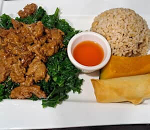 L14. Sweet Citrus Vegan Chicken Lunch $15.00 Marinated, thinly sliced soy protein in a sweet and tangy citrus sauce on a bed of kale, topped with almonds