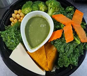 Ginger Root Macro Bowl $18.00 Steamed pumpkin, chickpeas, kale, green seaweed, broccoli, carrots, and tofu on rice with mint chutney dressing