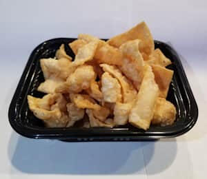 Deep fried Wonton strips served with duck sauce