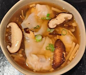 04. Hot & Sour Wonton Soup (Spicy) $12.00 Hot and sour soup with tofu, mushrooms, bamboo shoots, and wontons