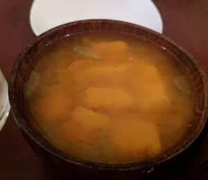 02. Pumpkin Soup $8.00 Pumpkin soup with yam, white beans, and celery