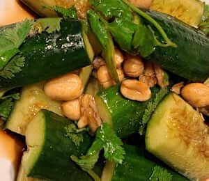 16. Cucumber Salad $10.00 Mixed cucumber salad with peanuts, chopped garlic, cilantro, and balsalmic vinegar