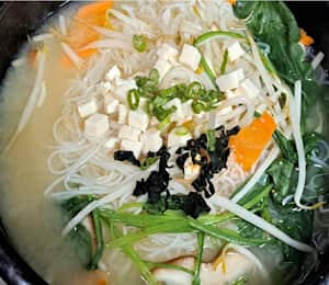05. Mai Fun Noodle Soup $14.00 Vermicelli, tofu, seaweed, spinach, carrots, and mushrooms in miso soup