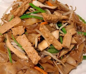 • Chow Fun - Vegan Chicken $21.00 Stir-fried flat rice noodles with vegan chicken (soy protein), onions, snow peas, bean sprouts, and carrots