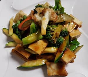 D03. Sauteed Tofu Vegetables $17.00 Sautéed firm tofu, broccoli, zucchini, carrots, baby corn, and snow peas in brown kung-pao sauce