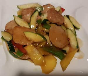 D07. Mango Vegan Chicken $19.00 Sautéed thinly sliced soy protein in a mellow plum sauce with mango, zucchini, asparagus, bell peppers, and onion