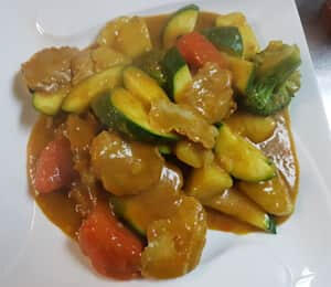 D10. Malaysian Curry Stew (Spicy) $19.00 Sautéed soy protein in a coconut curry with broccoli, carrots, zucchini, and potatoes