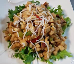 D15. Vegetables Medley Lettuce Wrap $20.00 Sautéed diced vegetables: shiitake mushrooms, jicama, peppers, onions, celery, and tofu, topped with pine nuts. (Comes with four pieces of Boston lettuce wrappers.)
