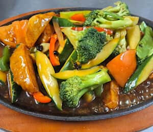 D16. Vegan Chicken Cutlet Platter $20.00 Sautéed, thinly sliced, breaded soy cutlets in a tangy black bean sauce with broccoli, onions, carrots, zucchini, and bell peppers