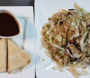 D05. Shredded Moo Shu Vegetables $18.00 Sautéed shredded cabbage, shiitake mushrooms, carrots, and woo ear mushrooms in hoisin sauce. (Comes with four wrappers.)